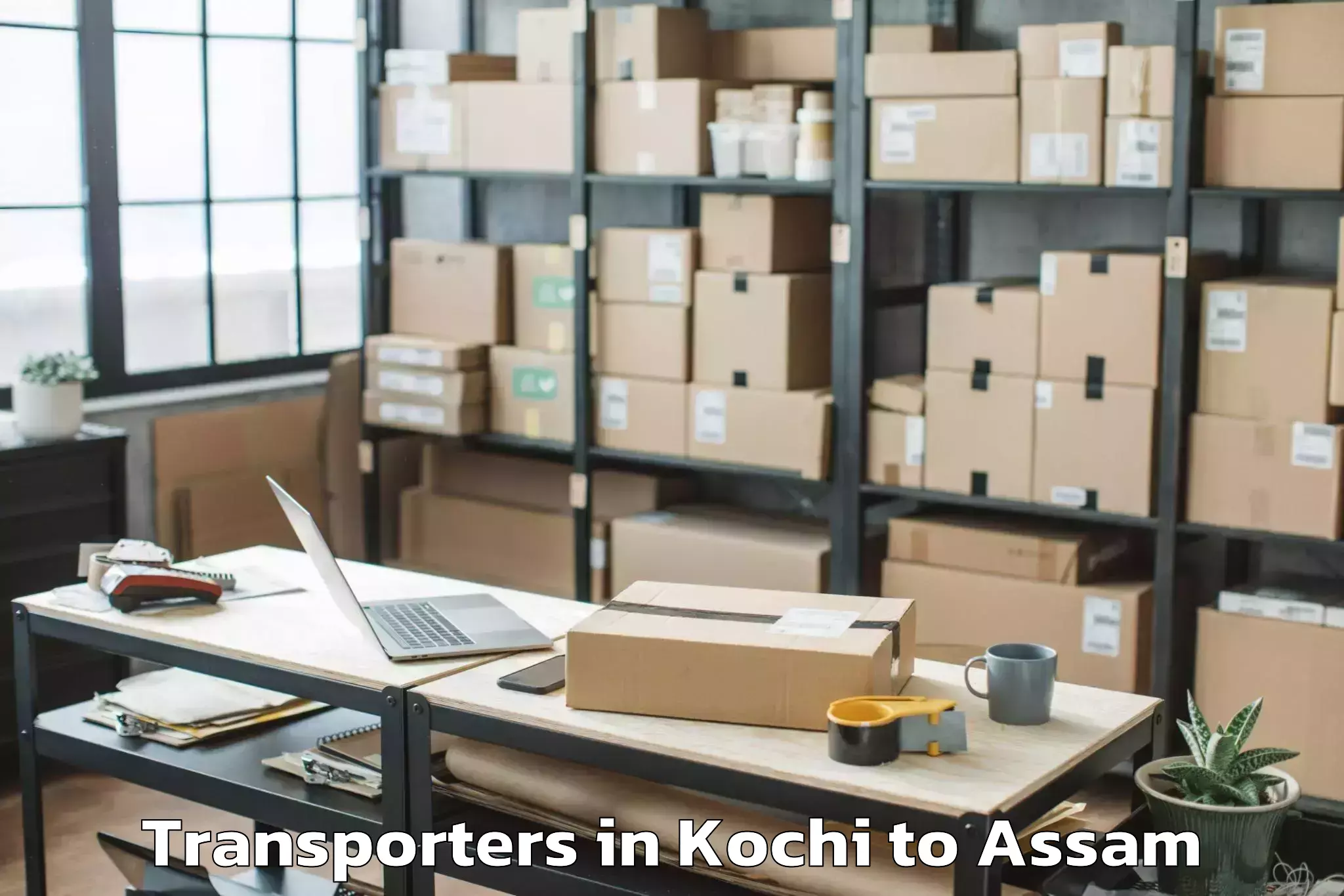 Top Kochi to Sualkuchi Transporters Available